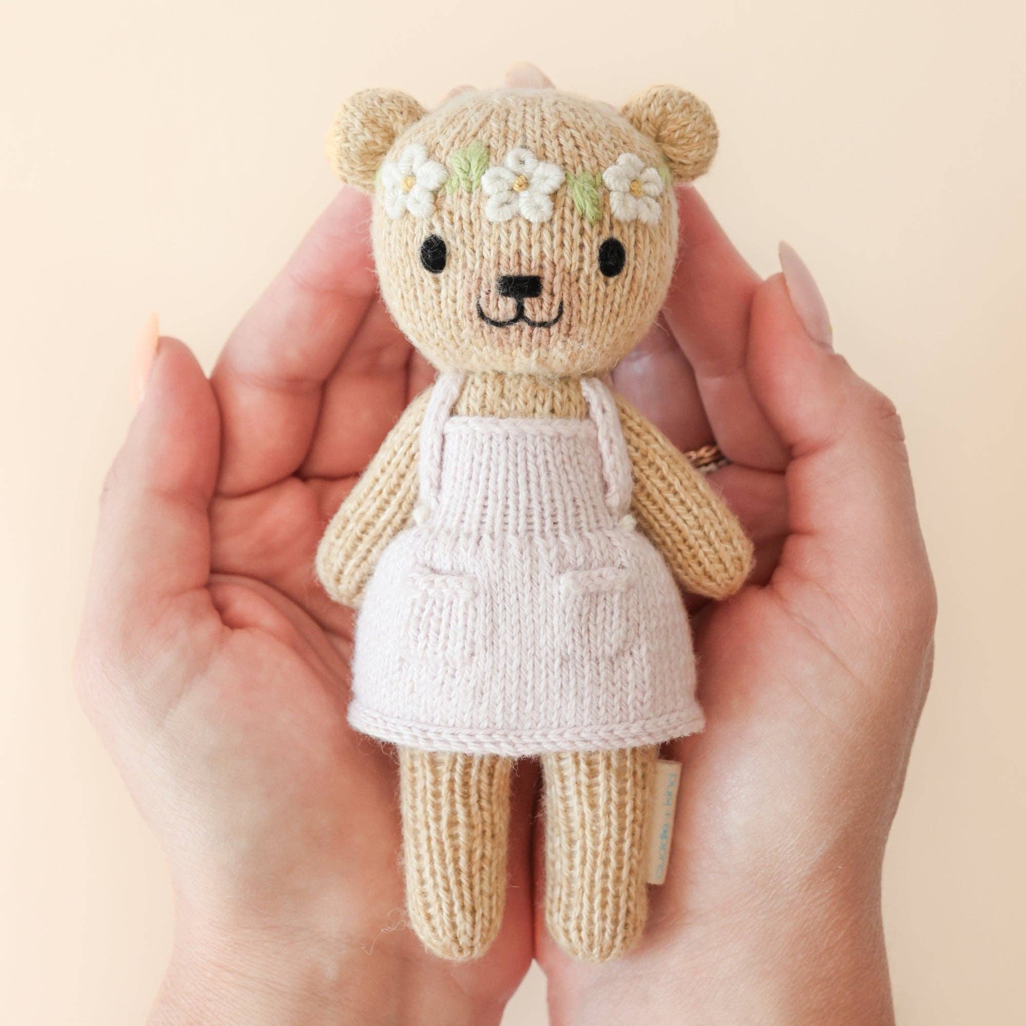 Tiny Olivia the honey bear, gives 10 meals
